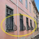 The Meaning Behind the Curved Bottom of Some Window Bars