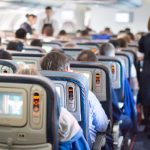 Father Holding Daughter’s Head on Plane Draws Praise and Criticism