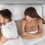 What does it mean when your partner turns their back on you while you sleep?