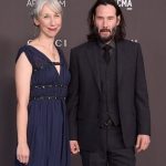 Keanu Reeves’ girlfriend, 54, faces mixed reactions after posing in teal cut-out dress on red carpet